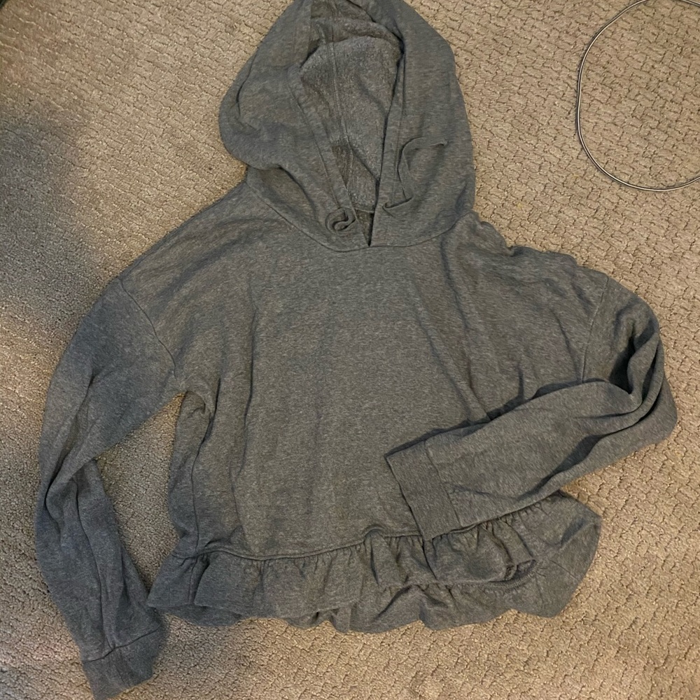 Ruffled bottom sweatshirt